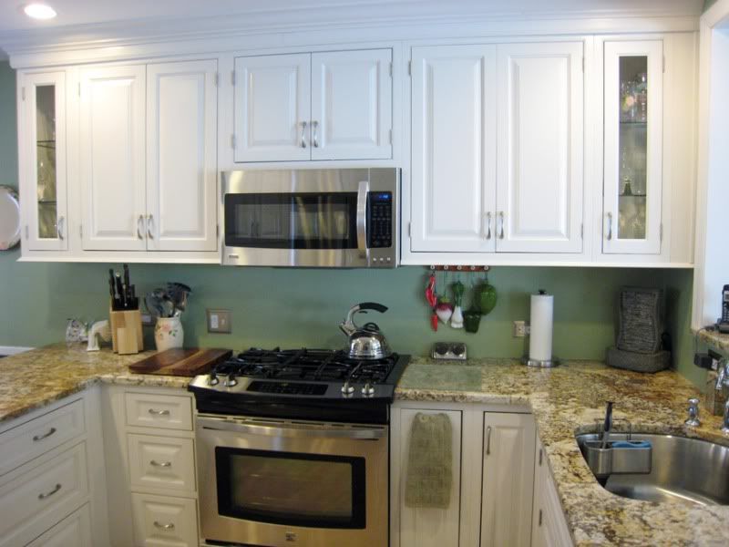 range wall after photo kitchen_sinkstoveview_after.jpg